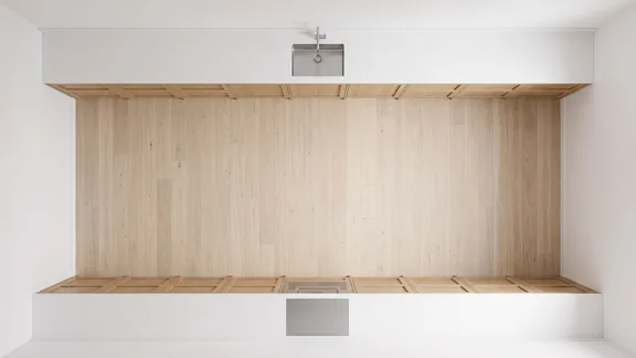 Top-down view of a galley kitchen with cabinets on two facing walls